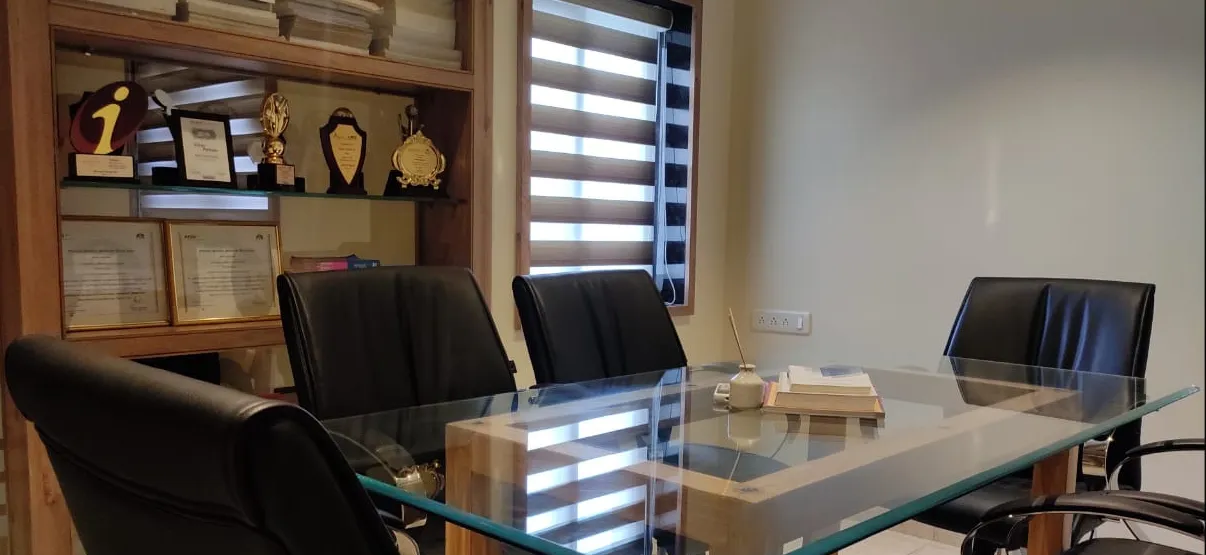Meeting table and recognition awards at the Kanethic office